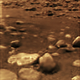 This image of Titan’s surface, taken by the Huygens probe, is the only image from the surface of a body further away than Mars. (Image: NASA/Huygens)